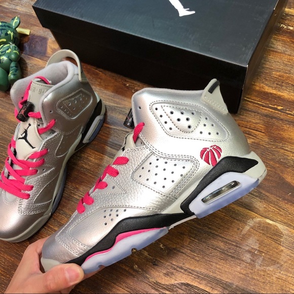 silver and pink jordans